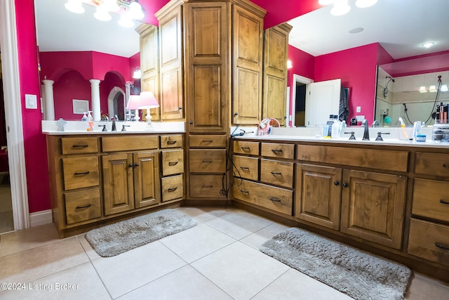 bathroom featuring tile patterned flooring and vanity