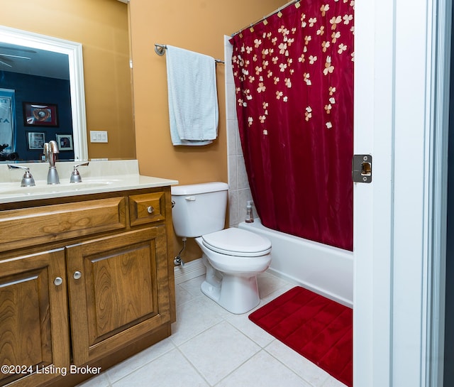 full bathroom with tile patterned flooring, vanity, toilet, and shower / tub combo