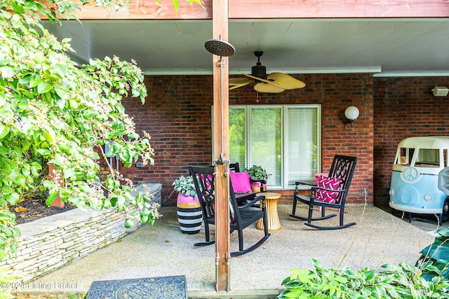 view of patio featuring ceiling fan