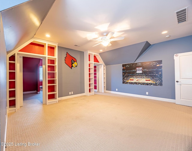 bonus room featuring carpet flooring, built in features, ceiling fan, and lofted ceiling