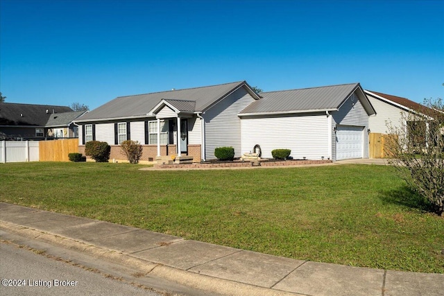 ranch-style home with a garage and a front yard