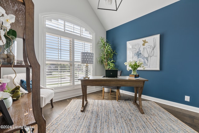 home office with hardwood / wood-style flooring and lofted ceiling