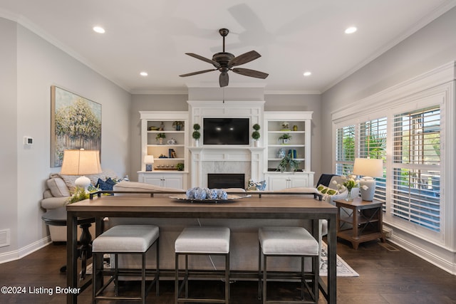 living room with ceiling fan, crown molding, and dark hardwood / wood-style flooring