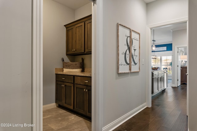 hall with dark hardwood / wood-style flooring