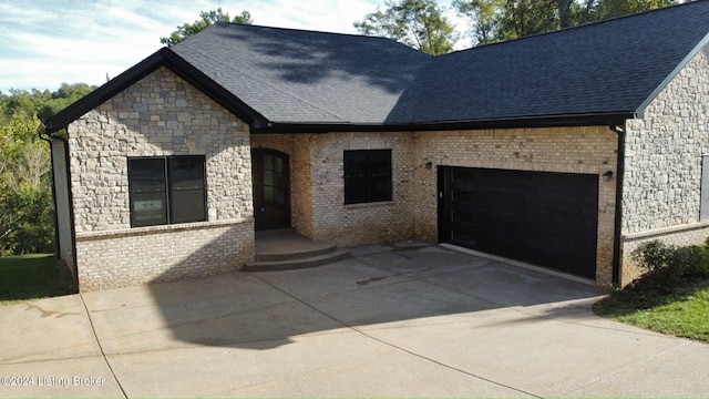 view of front of property featuring a garage