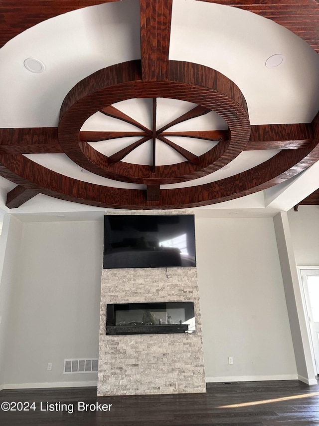 interior details with a fireplace and hardwood / wood-style flooring