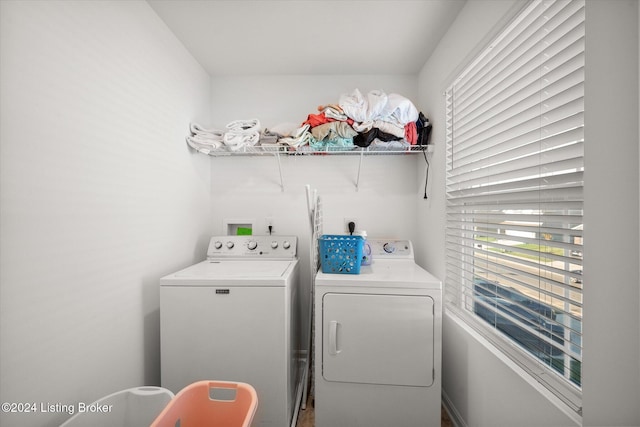 laundry room with washer and dryer