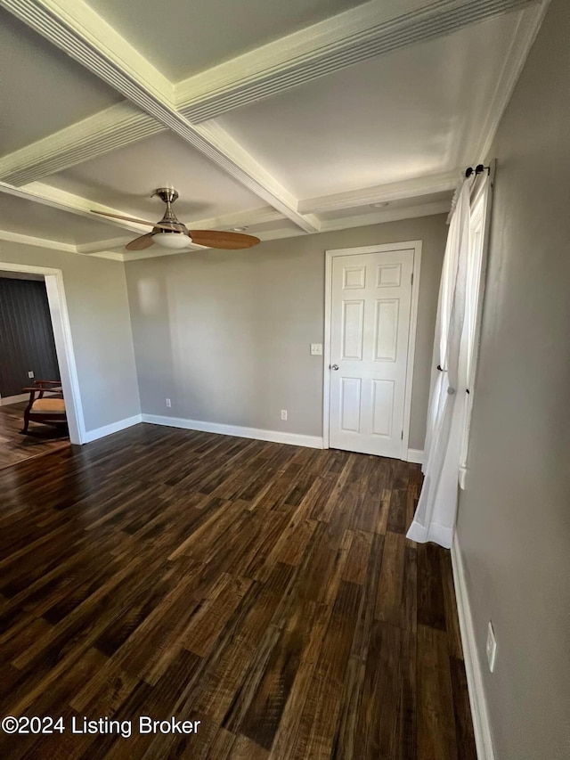 interior space featuring dark hardwood / wood-style floors, ceiling fan, and beam ceiling