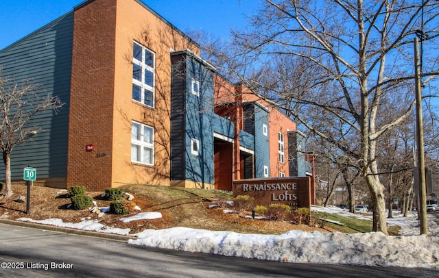 view of snow covered building