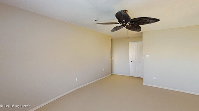 unfurnished room with light carpet and ceiling fan