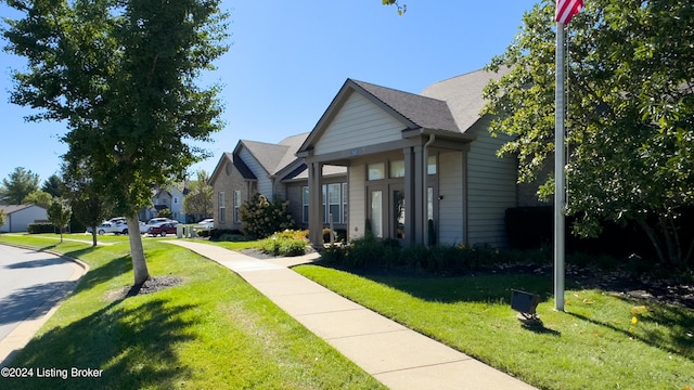 view of front of home featuring a front lawn