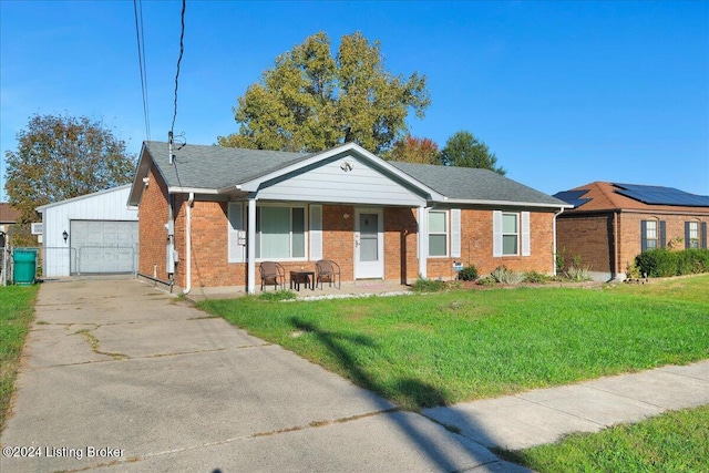 ranch-style home with a garage, a front yard, and covered porch