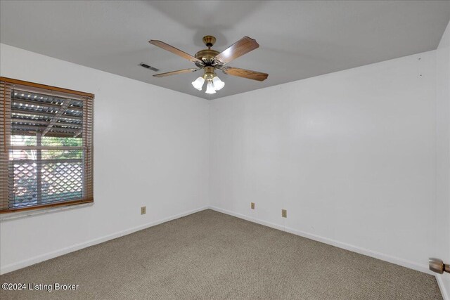 carpeted empty room with ceiling fan