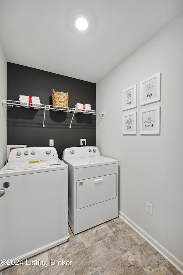 washroom with independent washer and dryer