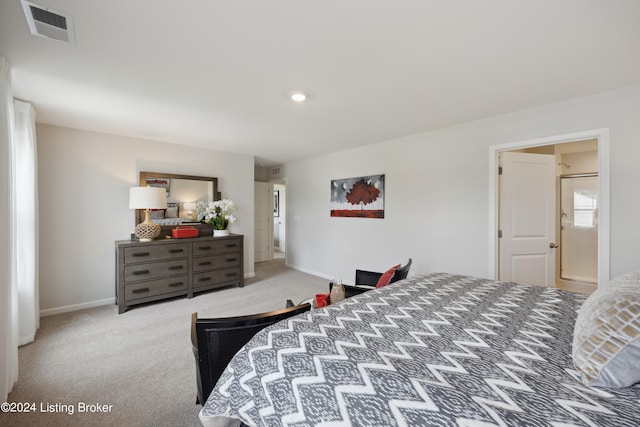 bedroom featuring light colored carpet