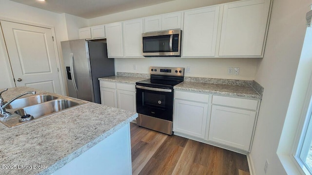 170 Coral Ridge Way, Brooks, KY 40109 - kitchen featuring white cabinets, a sink, appliances with stainless steel finishes, and dark wood finished floors