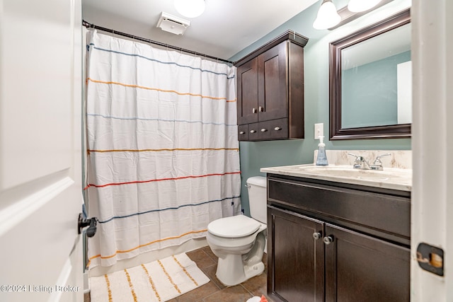 bathroom with vanity, tile patterned flooring, toilet, and a shower with shower curtain