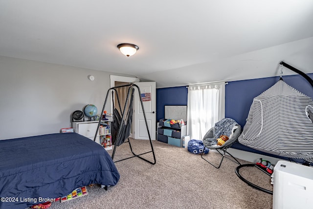 bedroom with light colored carpet