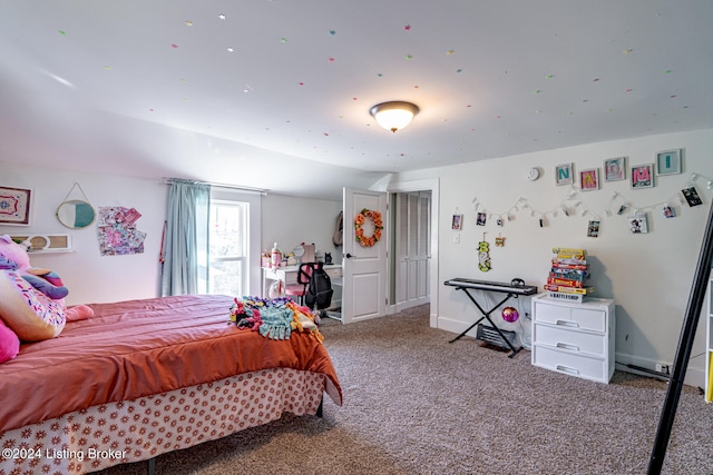 bedroom with vaulted ceiling and carpet flooring