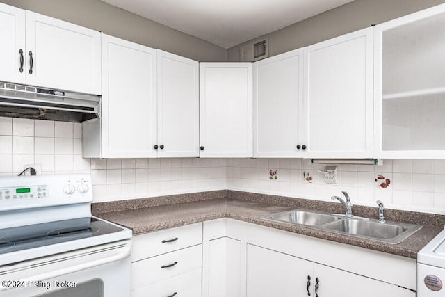 kitchen with white range with electric cooktop, range hood, and white cabinets