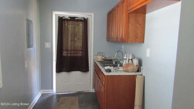 kitchen with electric panel and sink