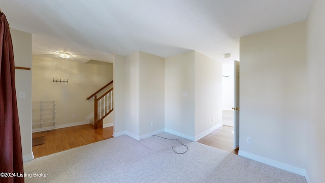 spare room featuring light hardwood / wood-style floors