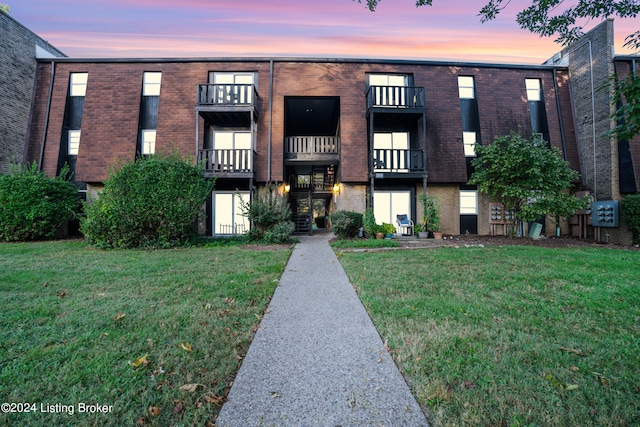 view of outdoor building at dusk