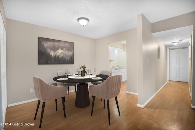 dining room featuring light hardwood / wood-style floors