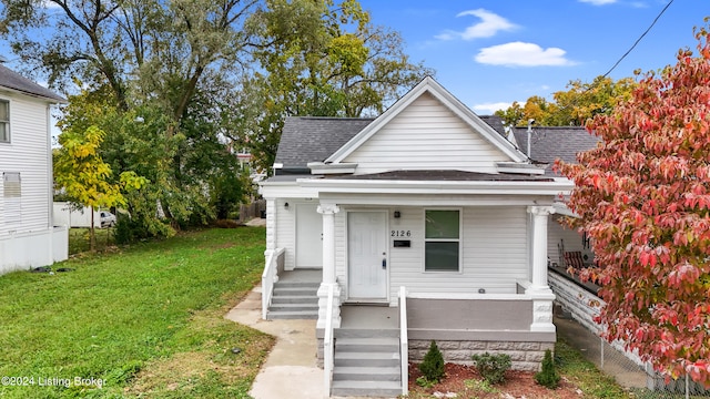 bungalow with a front yard