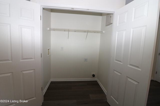 clothes washing area featuring dark hardwood / wood-style flooring and hookup for an electric dryer