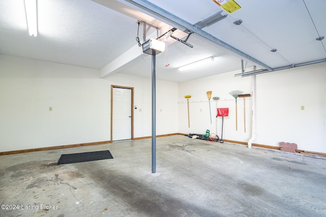 garage featuring a garage door opener