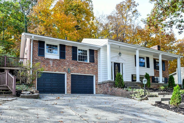 split foyer home featuring a garage