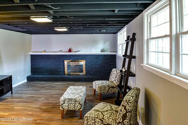 sitting room with hardwood / wood-style floors