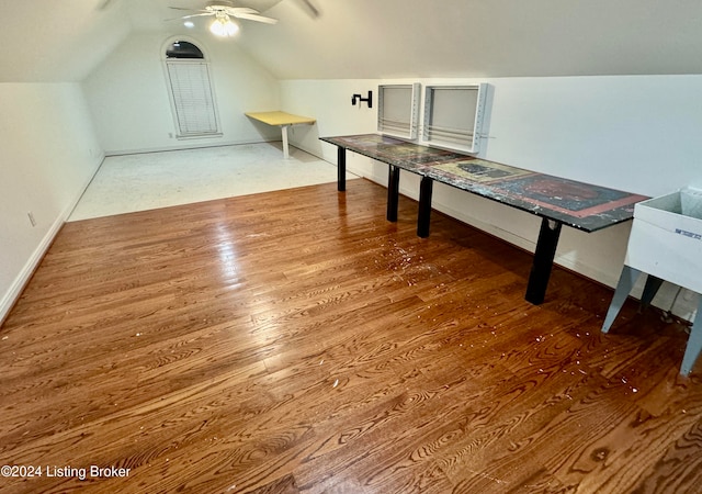 dining room featuring lofted ceiling, hardwood / wood-style floors, and ceiling fan