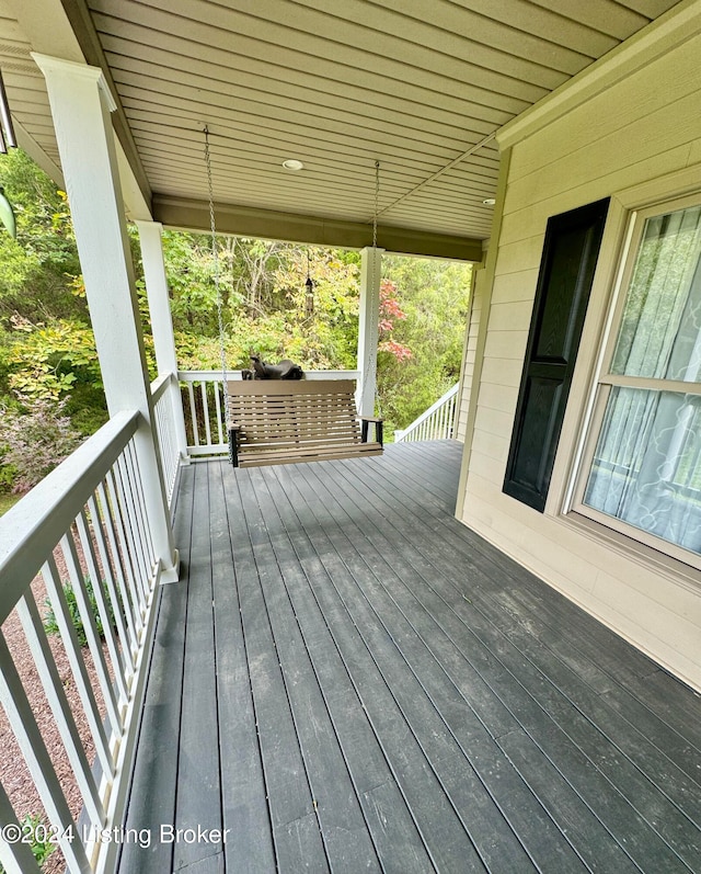 wooden terrace with covered porch