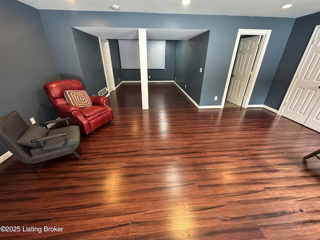 living area with dark wood-type flooring