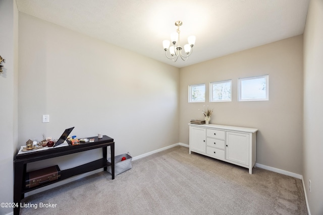 miscellaneous room featuring light colored carpet and an inviting chandelier