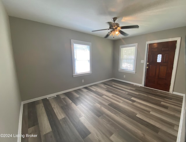 foyer entrance featuring dark hardwood / wood-style floors and ceiling fan