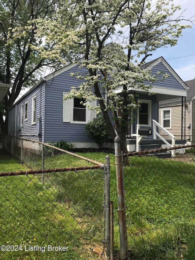 view of front facade with a porch and a front yard