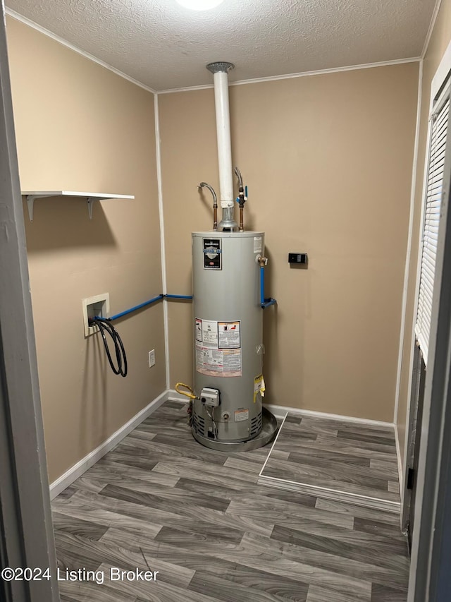 utility room featuring water heater