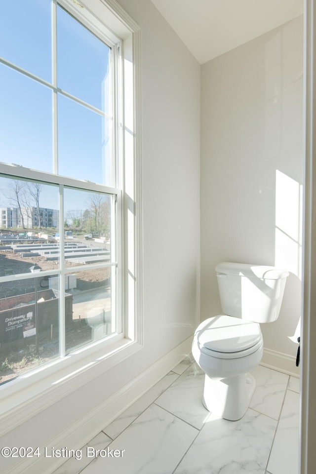 bathroom featuring toilet