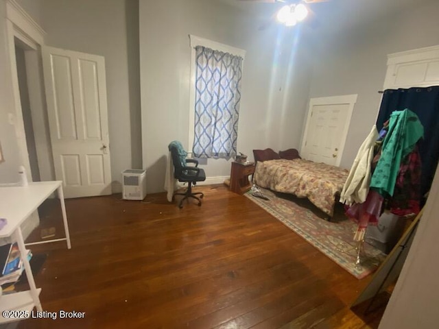 bedroom featuring dark hardwood / wood-style floors