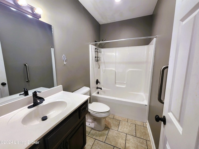 full bathroom with bathtub / shower combination, vanity, and toilet