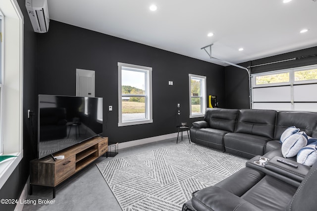 living room with an AC wall unit