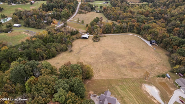 birds eye view of property featuring a rural view