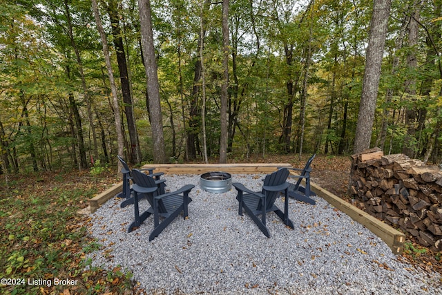 view of patio with a fire pit