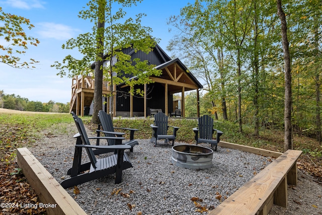 exterior space with an outdoor fire pit