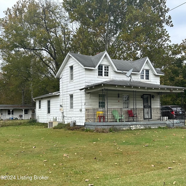 view of front of home featuring a porch and a front lawn