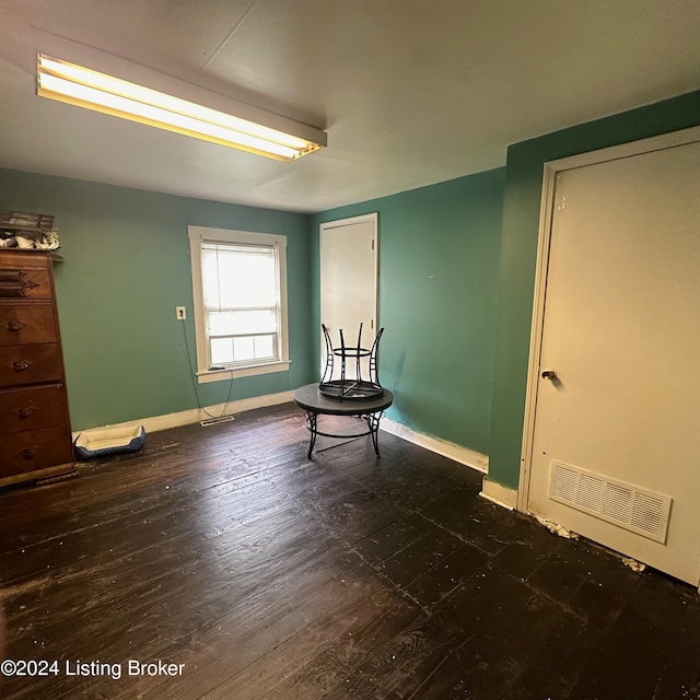 interior space featuring dark wood-type flooring