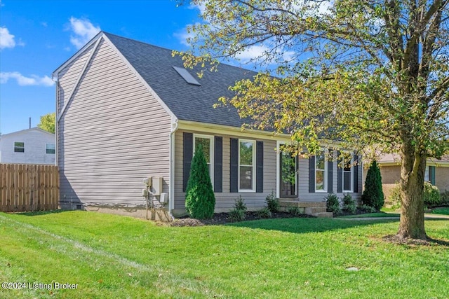 view of front of property with a front lawn